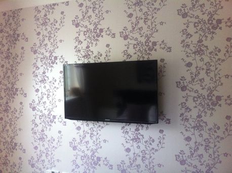tv installation on a wall